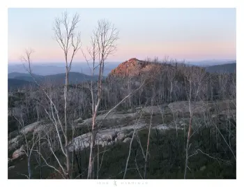 Photograph looking out over Booroomba rocks towards Canberra.